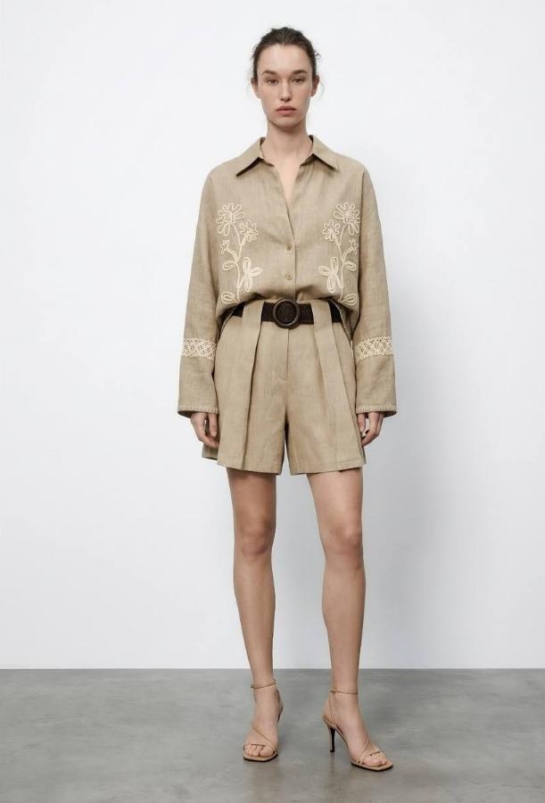 Model in beige shirt dress from Rhyme & Hype